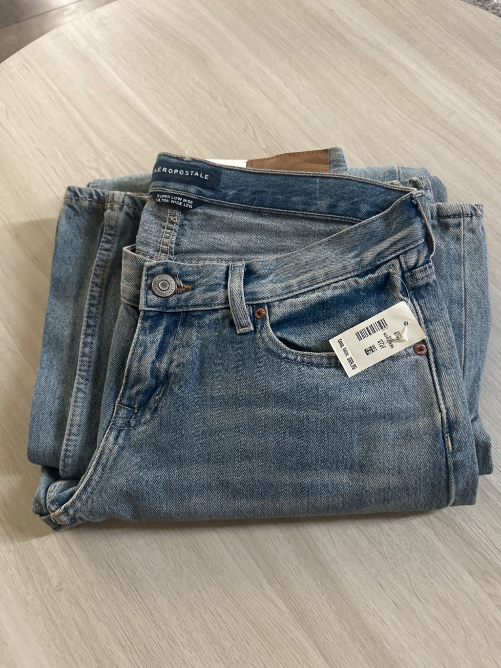 Super Low-Rise Ultra Wide Leg Poppy Jean medium wash - Picture 5 of 7